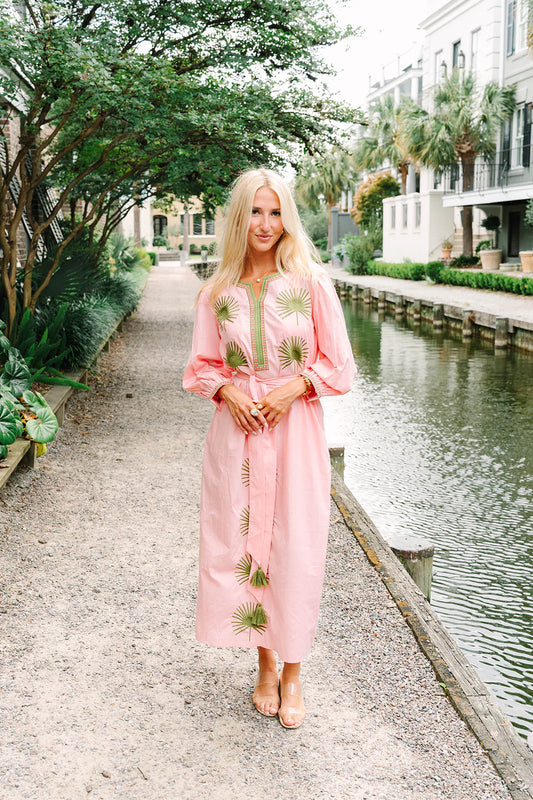 Victoria Dunn Quinn Dahlia pink midi dress with green embroidered palm leaf motifs and long balloon sleeves.
