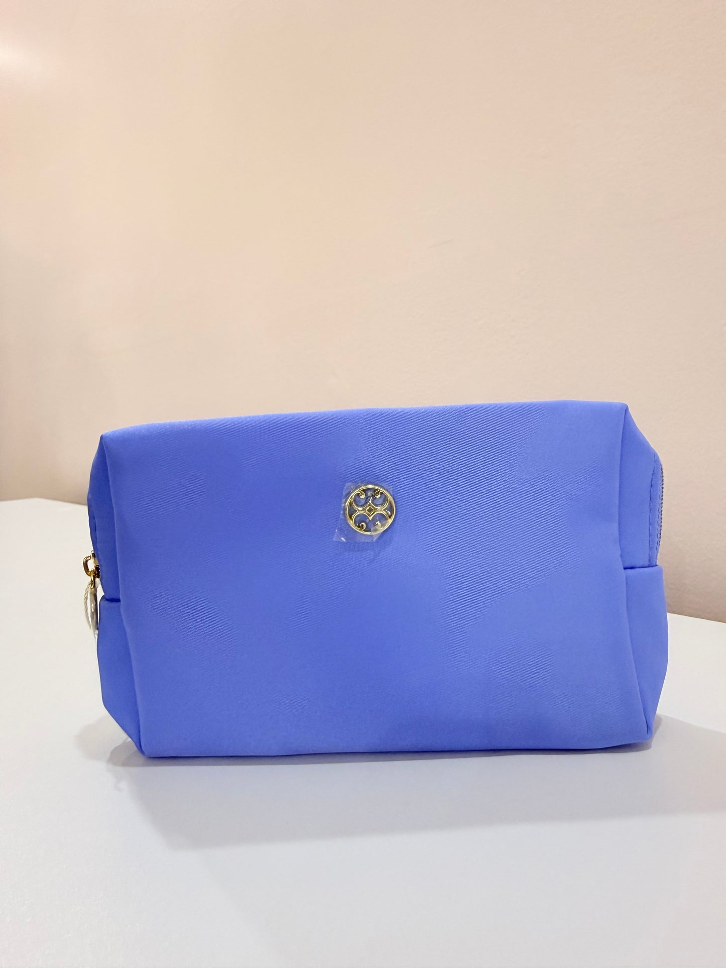 Mary Square Let's Face It Mini blue nylon cosmetic pouch with gold logo hardware and zipper closure.