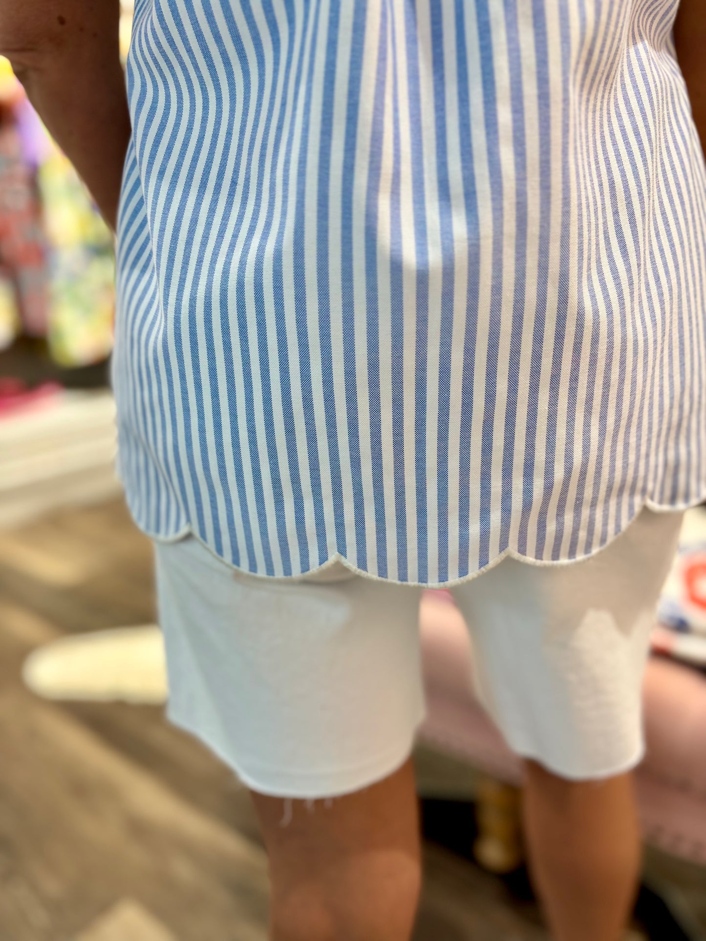 Amalfi brand blue and white striped vest top with decorative scalloped hem detail.