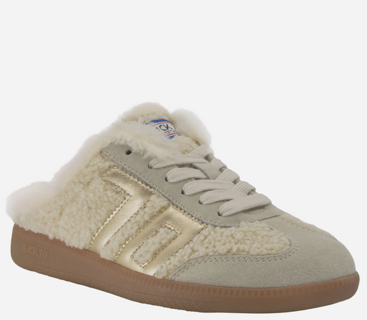 Back 70 Easter FL backless sneaker mule with shearling upper, gold metallic stripe accents, suede toe cap, and gum sole.