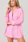 Vacay Out Of Office pink button-down oversized cover-up shirt with sun embroidery and colorful contrast stitching detailing.