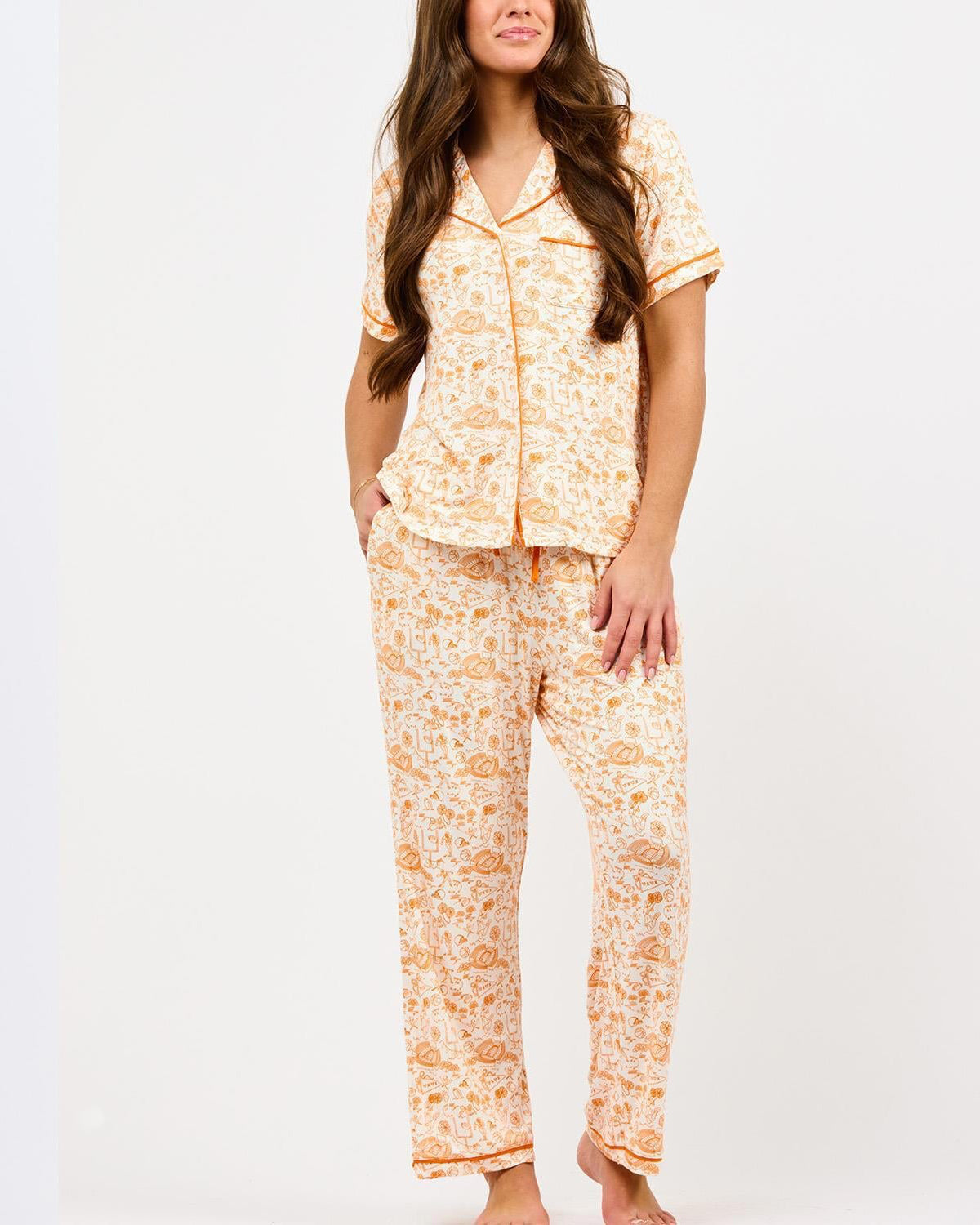 Mary Square Charlotte women's orange toile print short-sleeve button-up pajama set with matching pants.
