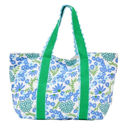 Mary Square Monaco large tote bag with blue floral print, green handles, and scalloped trim detailing.
