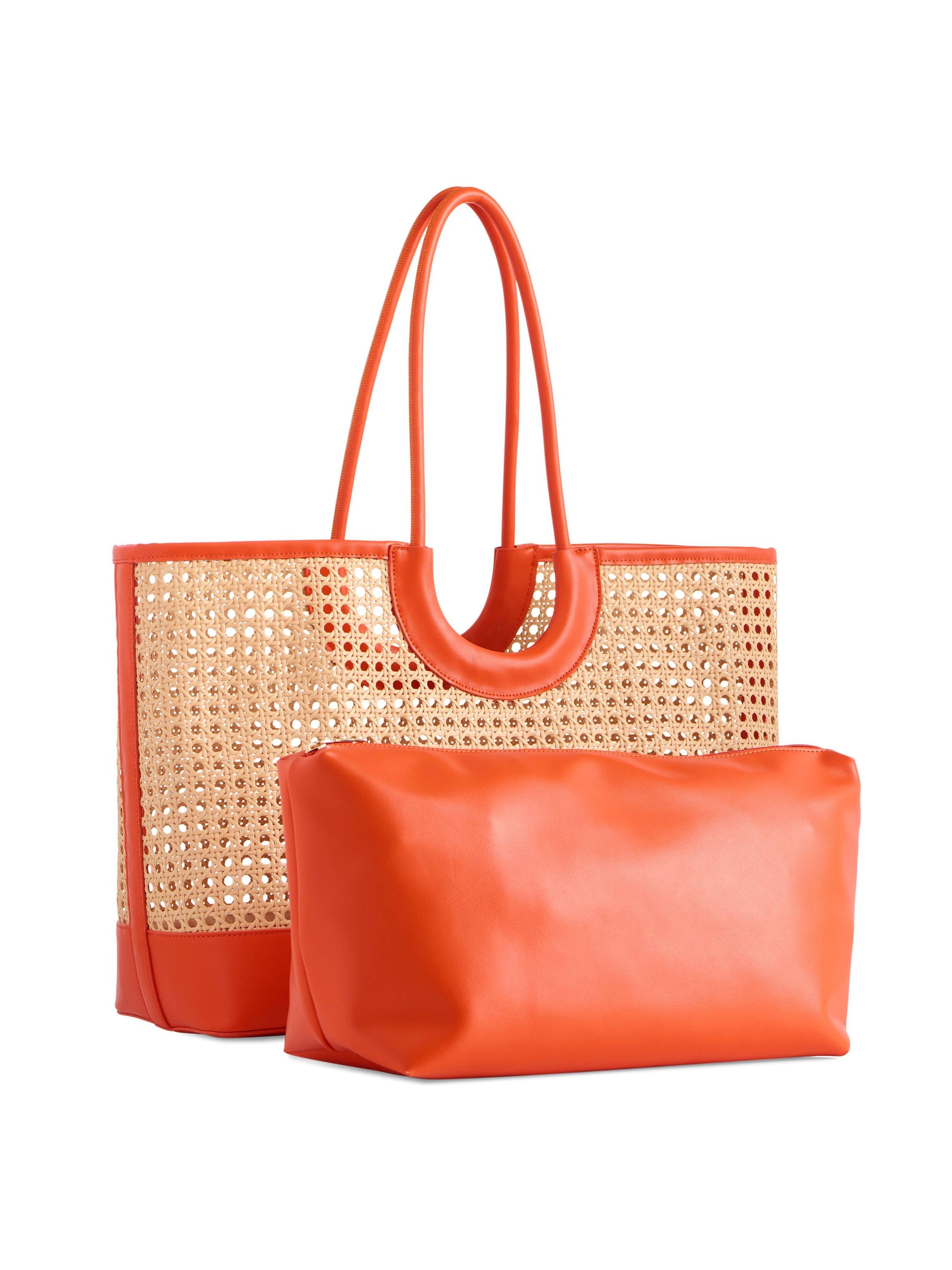 Lyra Tote bag featuring woven rattan body, orange leather trim, handles, and matching zip pouch insert.
