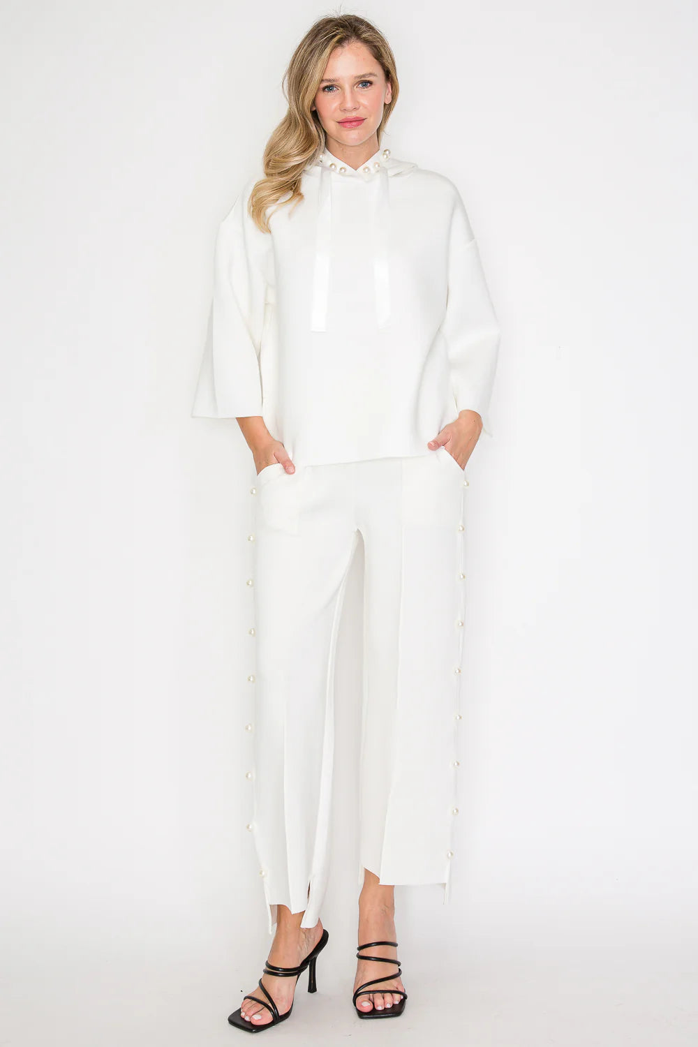 Joh Apparel Francine French Scuba Pearl Hoodie in white, front view on model, with pearl-trimmed hood and wide sleeves.