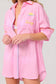 Vacay Out Of Office pink oversized button-up cover-up shirt with embroidered sunset logo and colorful stitching details.