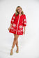 Victoria Dunn Presley red mini dress with white embroidered palm tree pattern and three-quarter sleeves.