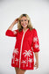 Victoria Dunn Presley red mini shirt dress with white embroidered palm tree print and three-quarter sleeves.