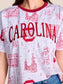 Stewart Simmons white Carolina Gamecocks toile print ringer tee with embroidered "CAROLINA" lettering and campus illustrat...