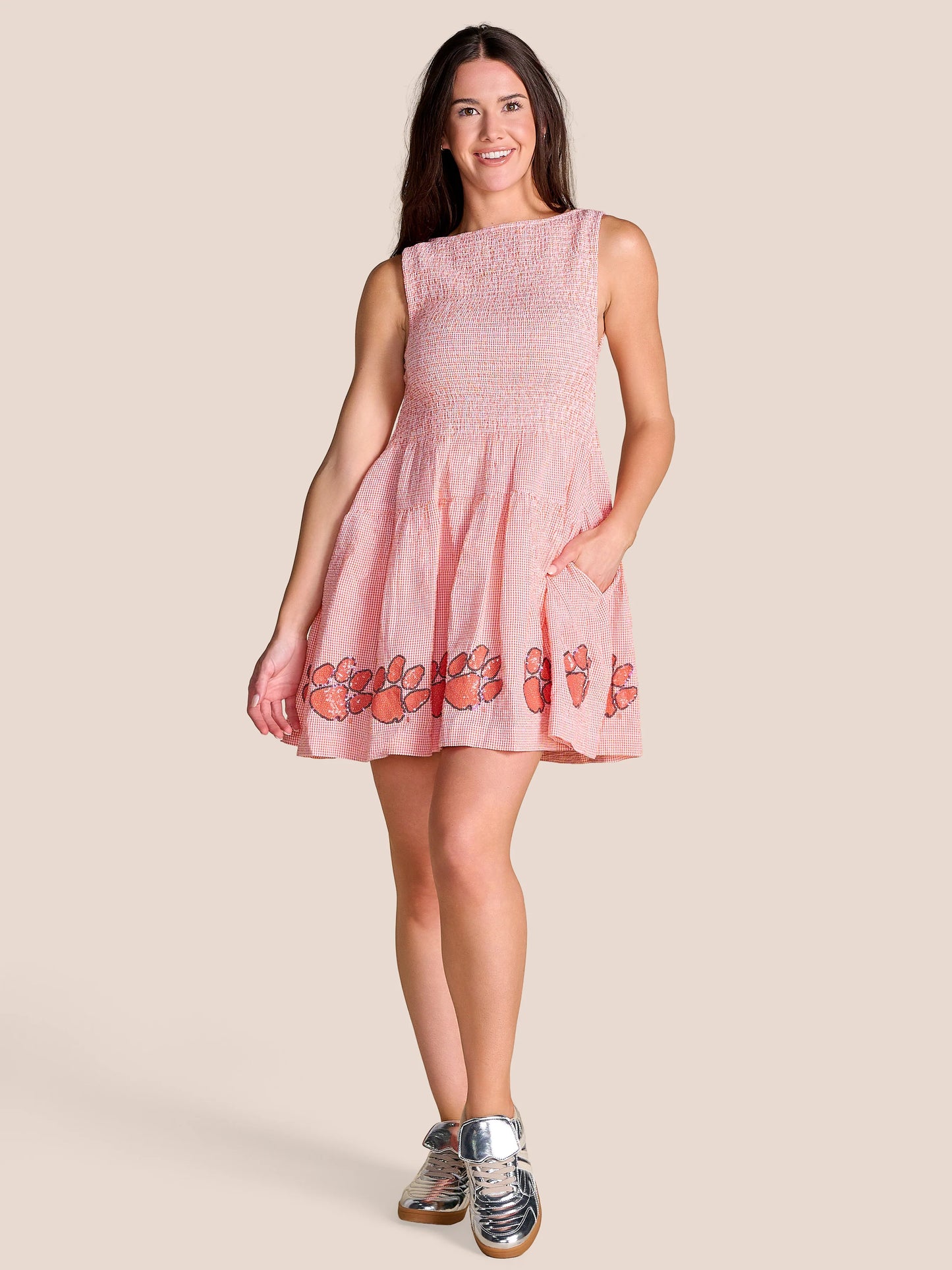 Stewart Simmons Good Sport Seersucker Dress Clemson, red gingham mini with smocked bodice, paw print hem, and pockets, front view.