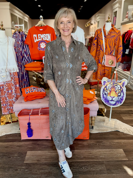 Boho Chic Embroidered Button-Front midi shirt dress with diamond print detailing, worn with white sneakers.
