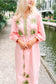 Victoria Dunn Quinn Dahlia pink maxi dress with green embroidered palm leaf motifs and belted waist.