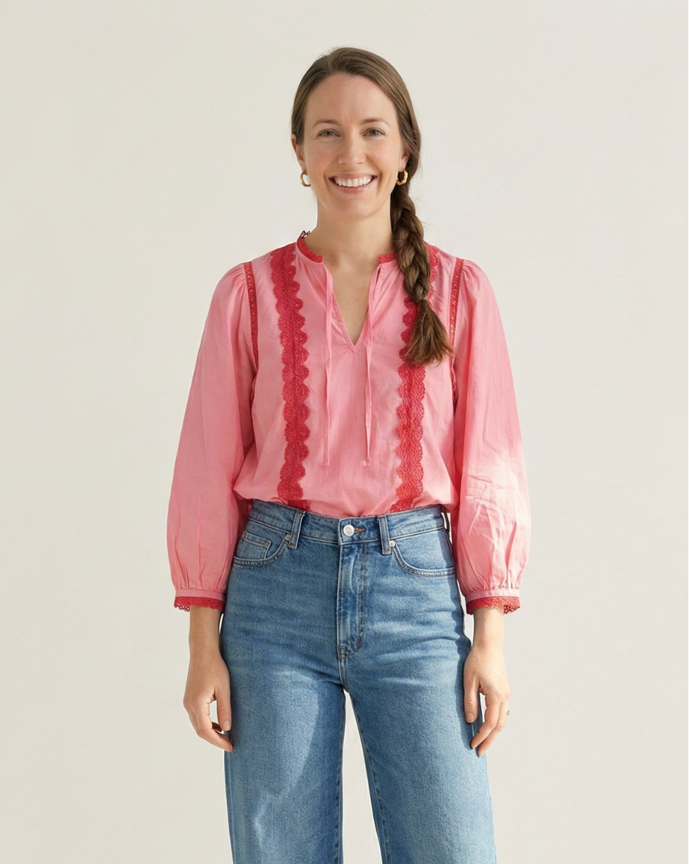 The Anya Blouse is the perfect blend of timeless style and everyday versatility. Crafted from breathable 100% cotton, this women’s embroidered eyelet blouse features intricate detailing that adds a feminine, elevated touch to any outfit. Designed with a removable tank top liner, it offers flexible styling options and comfortable coverage for effortless wear year-round.

Lightweight and easy to dress up or down, the Anya Blouse pairs beautifully with denim, trousers, or skirts
