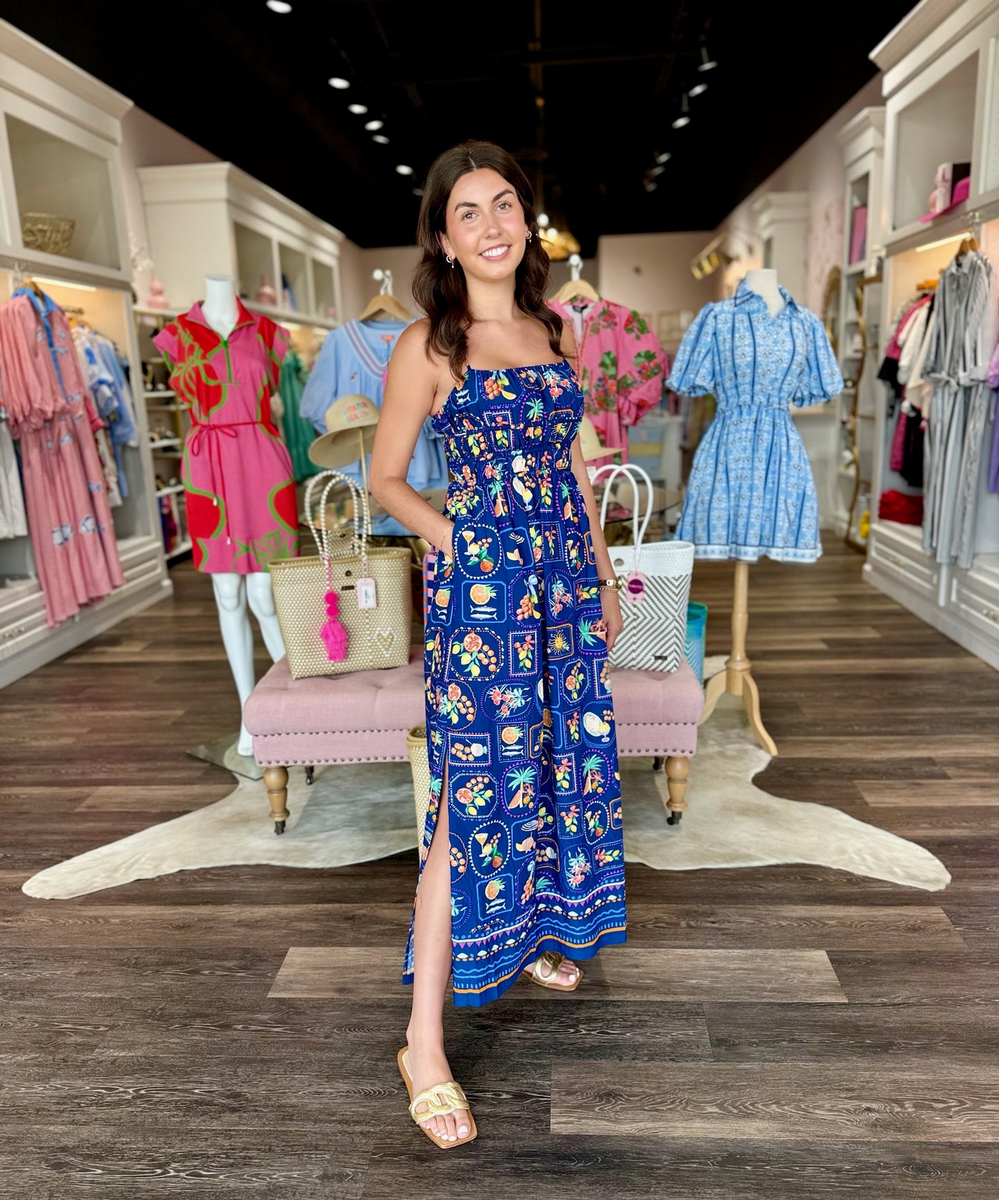 Joy Joy Tuscan cinched waist maxi dress with vibrant tile print, side slit, and smocked bodice.