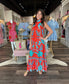Briton Court Strawberry Waves Charlie Maxi Dress featuring red floral halter neckline, tiered ruffle hem, and turquoise bo...