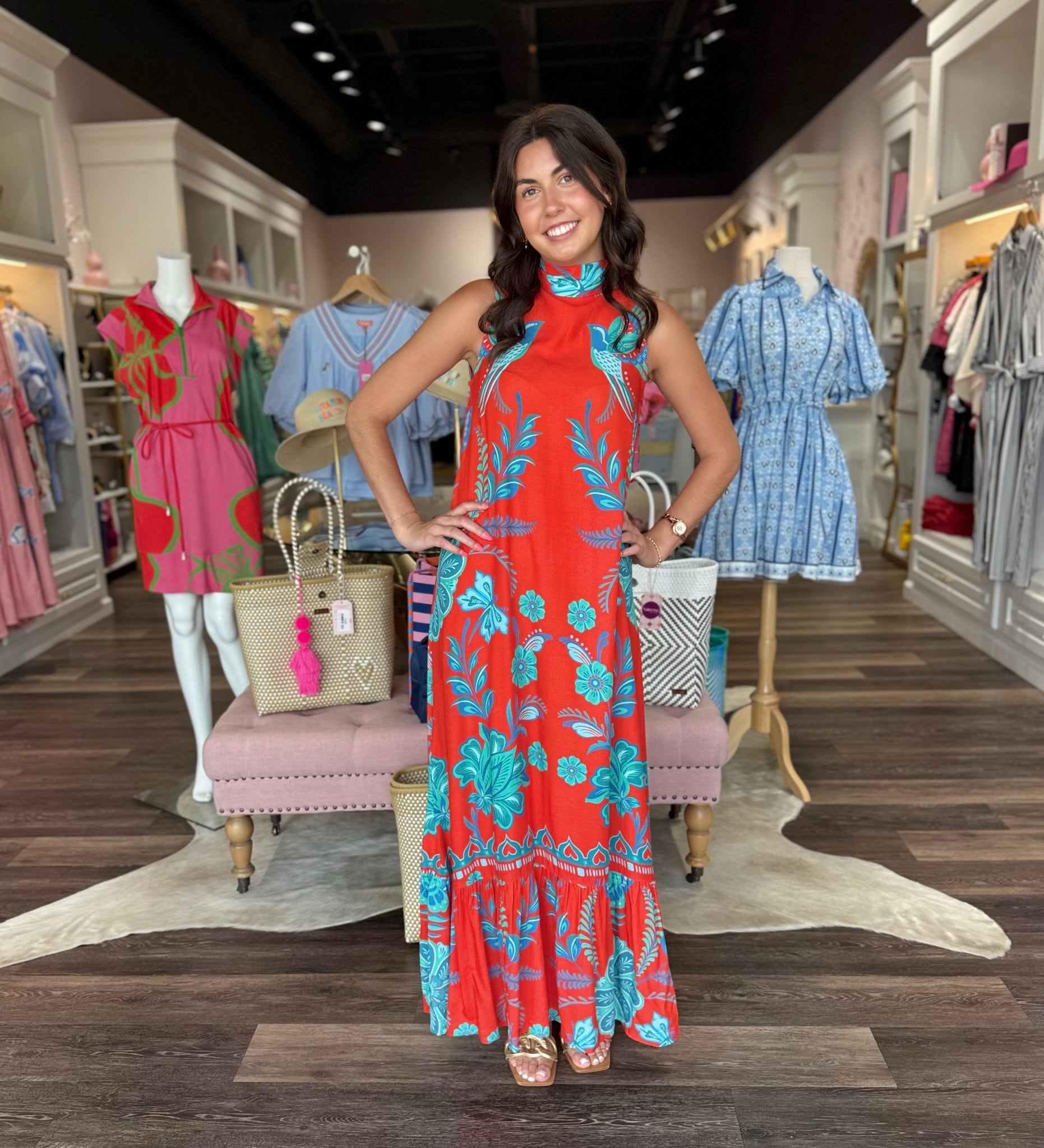 Briton Court Strawberry Waves Charlie Maxi Dress featuring bold floral print, mock neckline, and tiered ruffle hem.