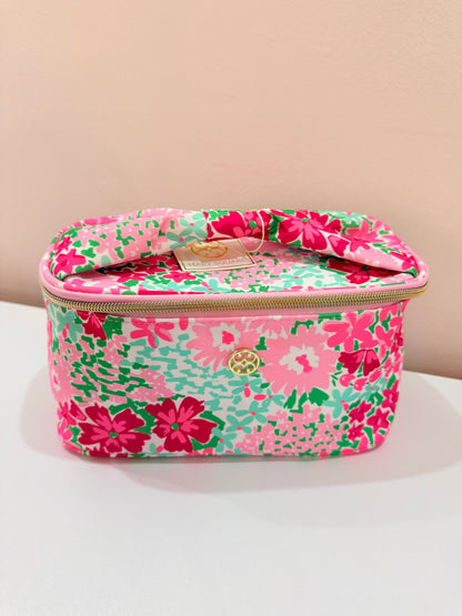 Mary Square floral cosmetic train case with gold zipper and pink, green, and teal flower print.