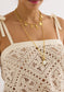 Alivia Kendra Top Seastar Crochet in cream, close-up front view showing open-knit pattern and tie shoulder straps on model.