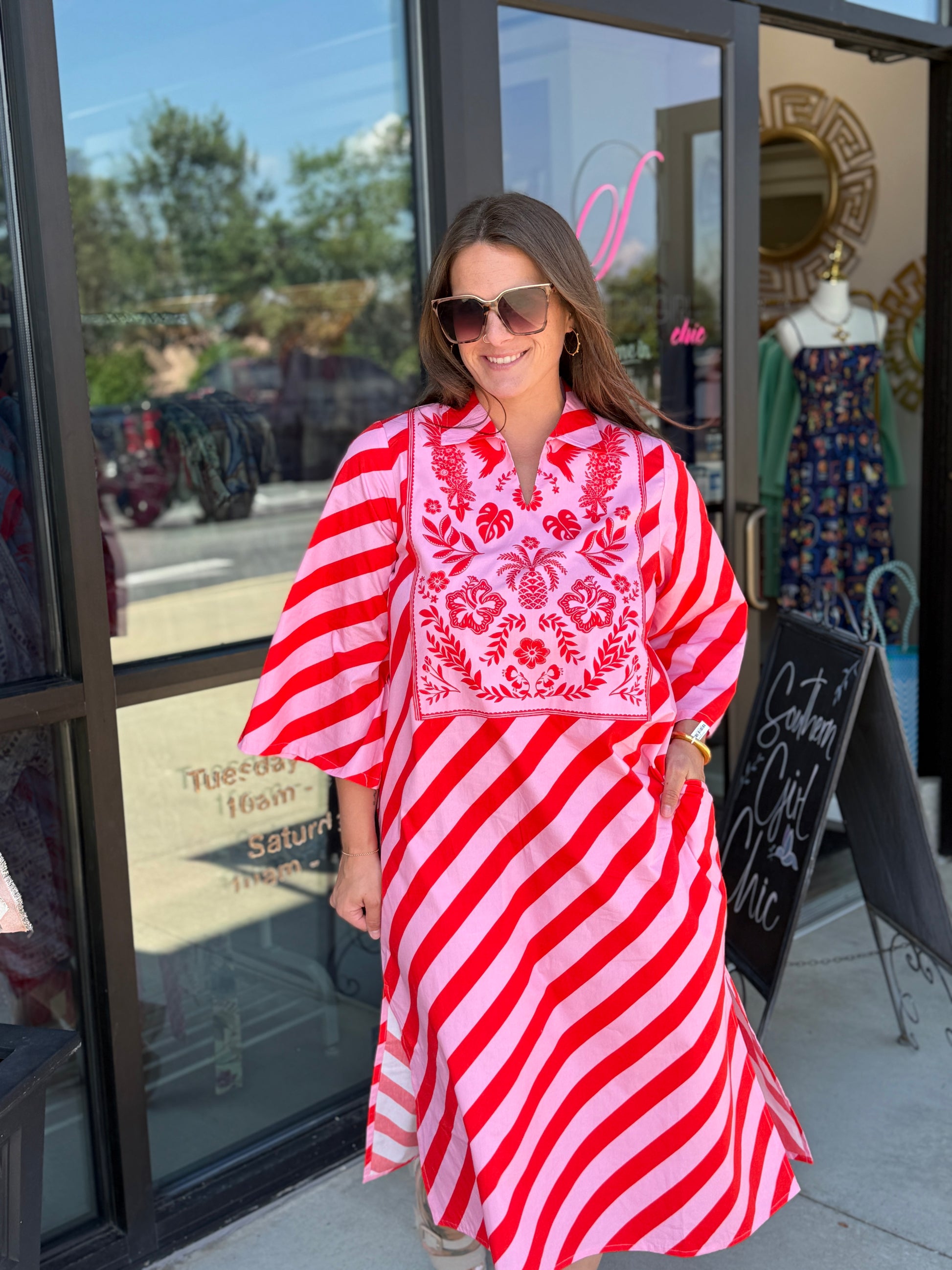 Maude Vivante Sophia Scarlet Slash Dress featuring red and pink diagonal stripes with floral embroidered bib detail.