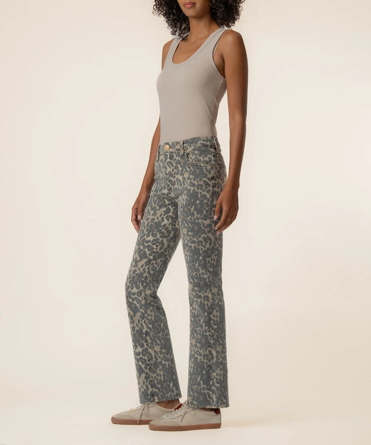 Kut Kelsey High Rise Ankle Flare jeans in blue-grey leopard print, side view on model with grey tank top and sneakers.