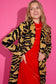 Alden Adair Darby Coat Noir Cat — long tiger-print blazer coat with bold black and golden stripes.