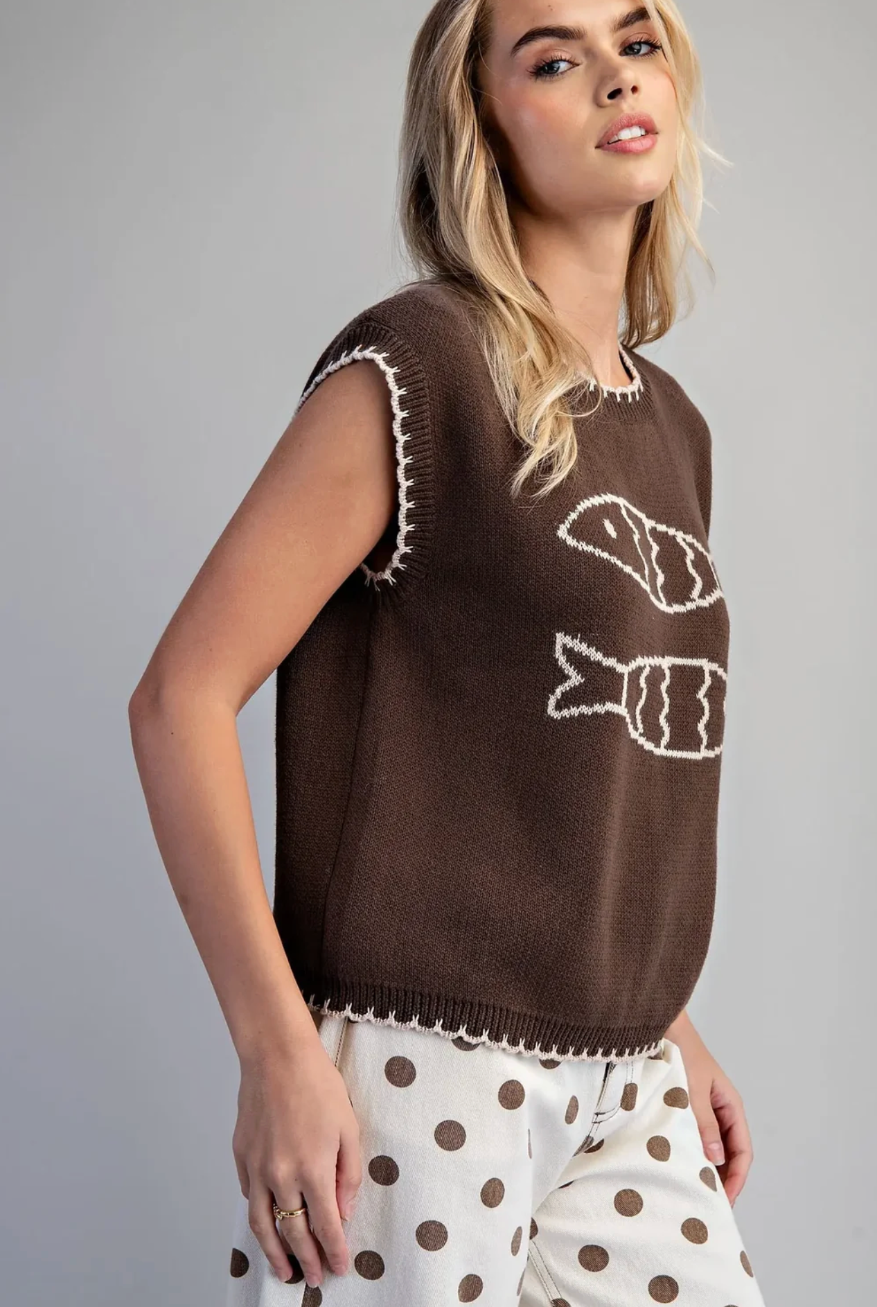 Fish Cap chocolate brown knit sleeveless vest top with cream fish graphic and whipstitch trim detailing.