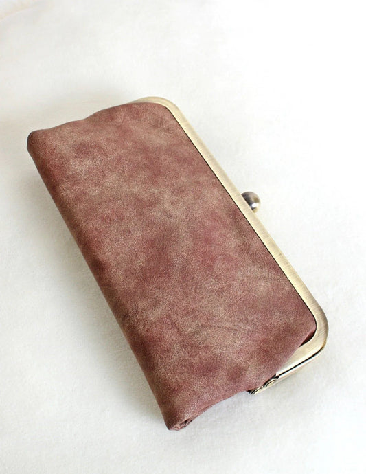 Karen Kiss Lock Clutch in Pearl Brown featuring distressed leather texture and antique gold kiss lock frame closure.