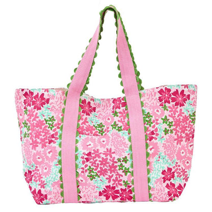 Mary Square Monaco large floral tote bag with pink handles, green scalloped trim, and vibrant pink and mint flower pattern.
