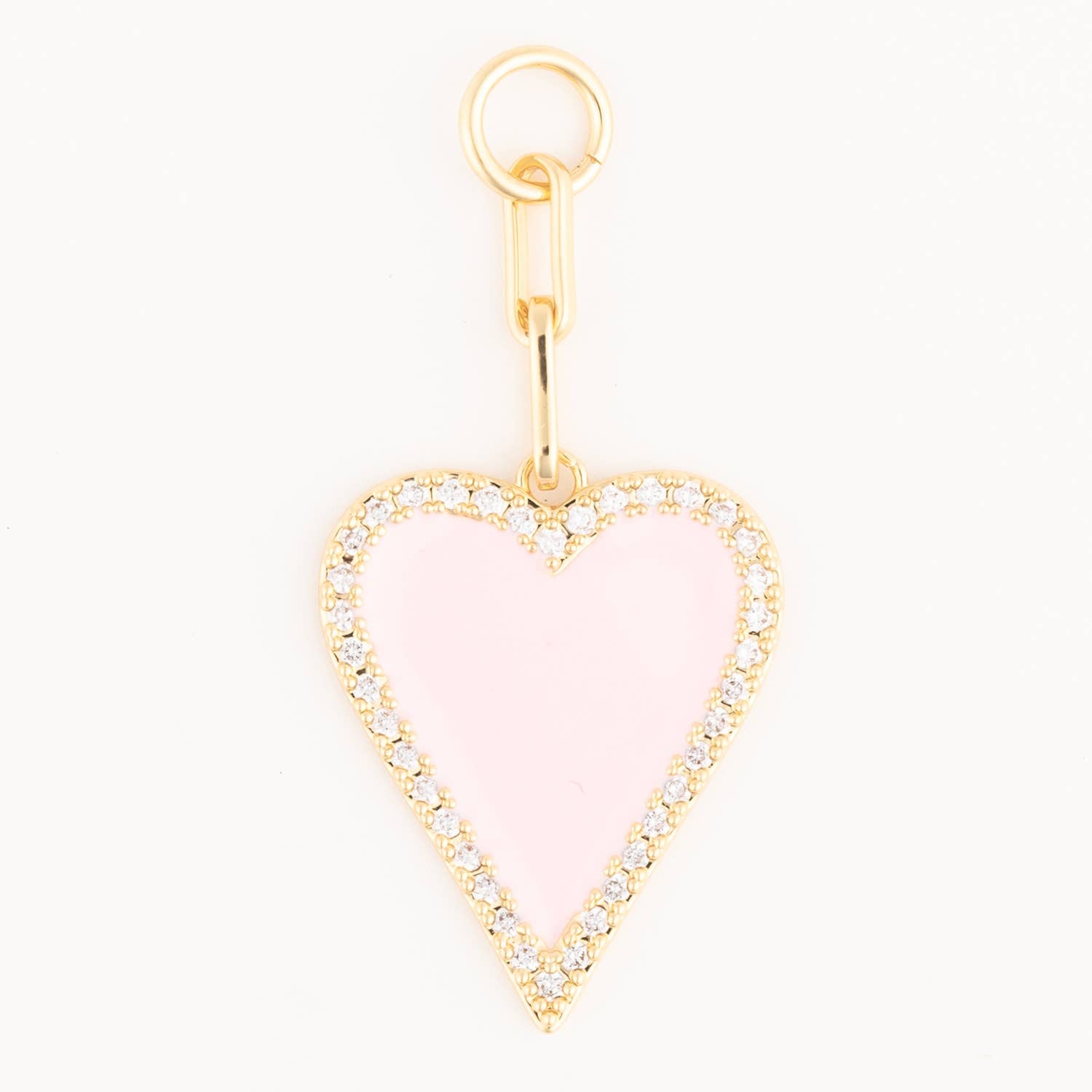 Michelle McDowell Charm Luxe Blush Heart — gold pendant with pale pink enamel center and crystal pavé border, front view.