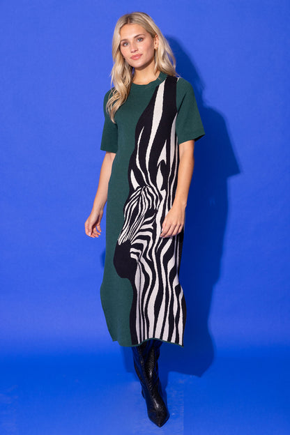 Alden Adair Scout Dress Wild Silhouette in forest green with bold black and white zebra print panel, midi length, model front view