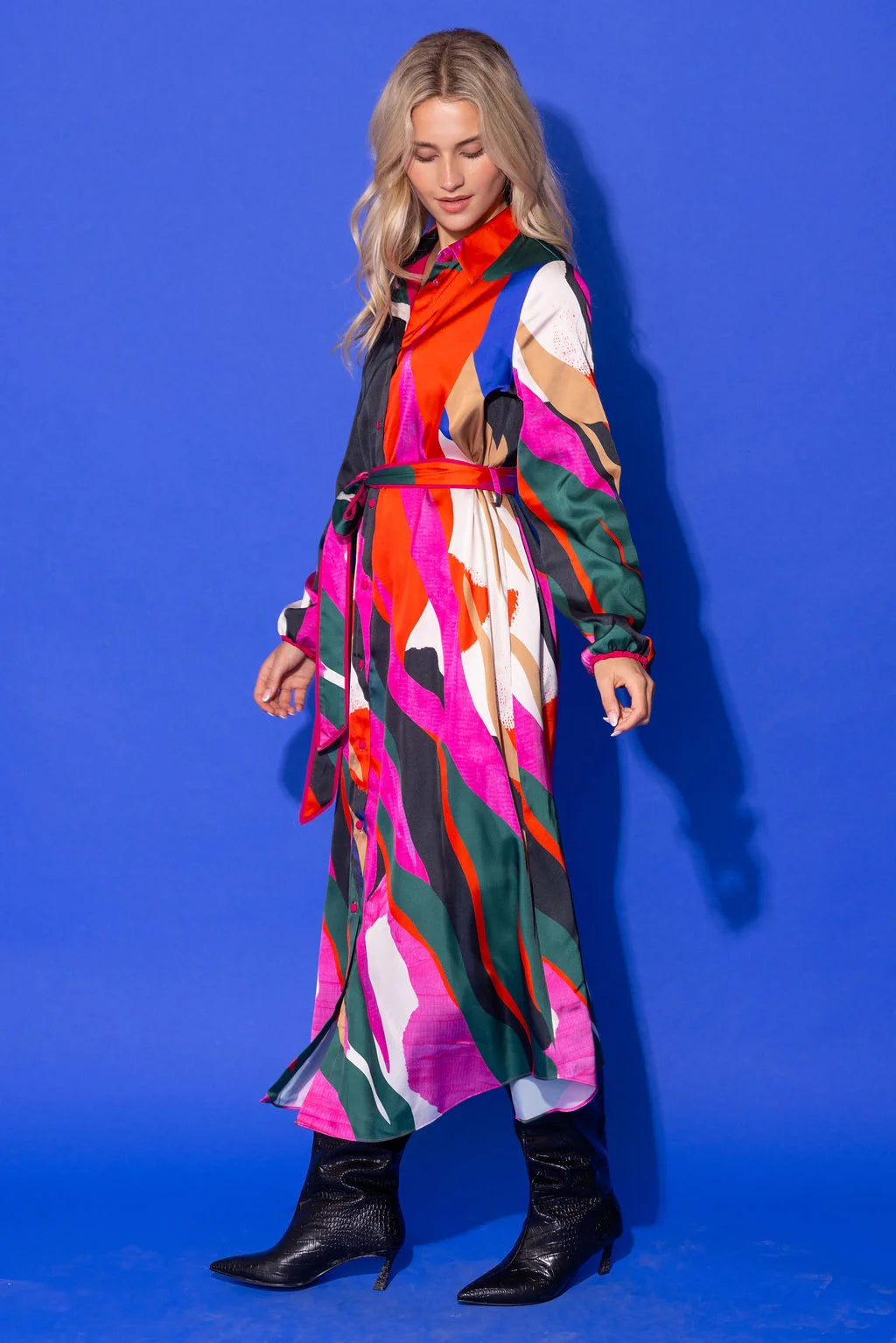 Alden Adair Bronte Dress Solar Vines: model wearing multicolor abstract print maxi shirtdress with red sash belt and black boots