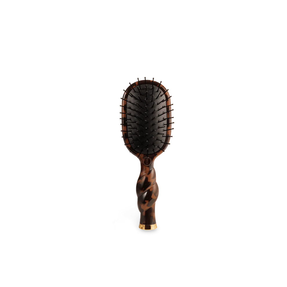 Teleties Mini Detangler Hair Brush in tortoise print with twisted handle, paddle head, and black bristles.